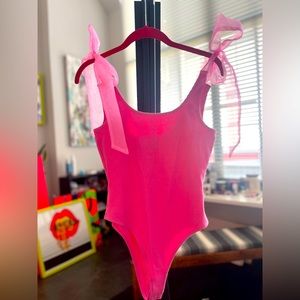 Hausen pink body suit